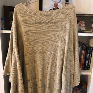 Gold sweater with gold tank and bat wing sleeves